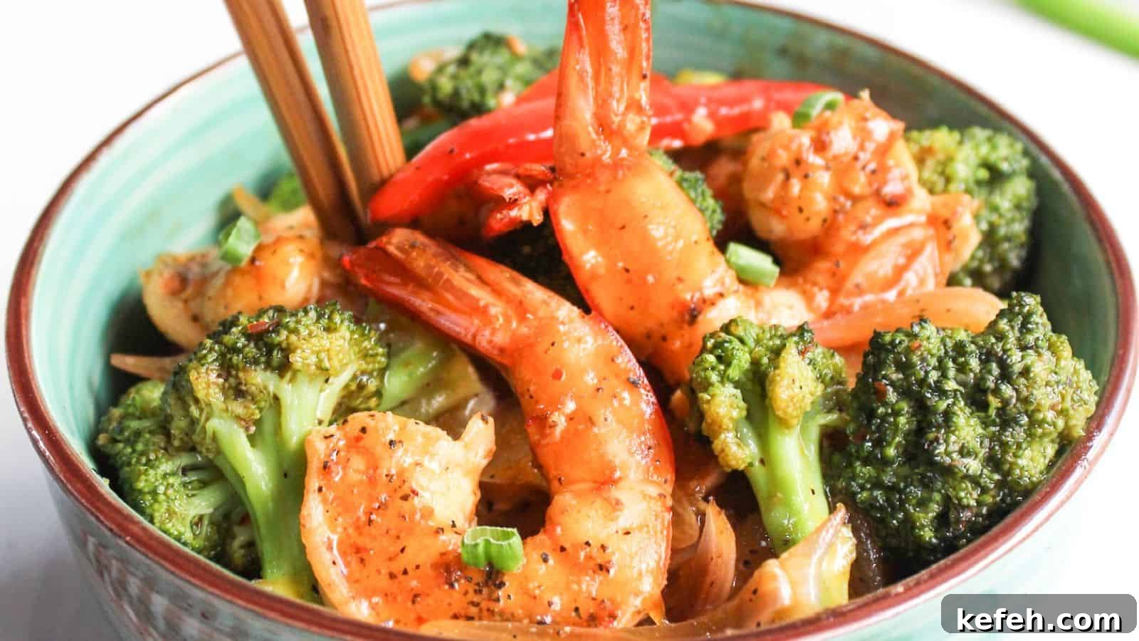 30 Seafood Recipes That Turn Weeknights Into a Vacation 14 Shrimp and broccoli stir-fry in a bowl.