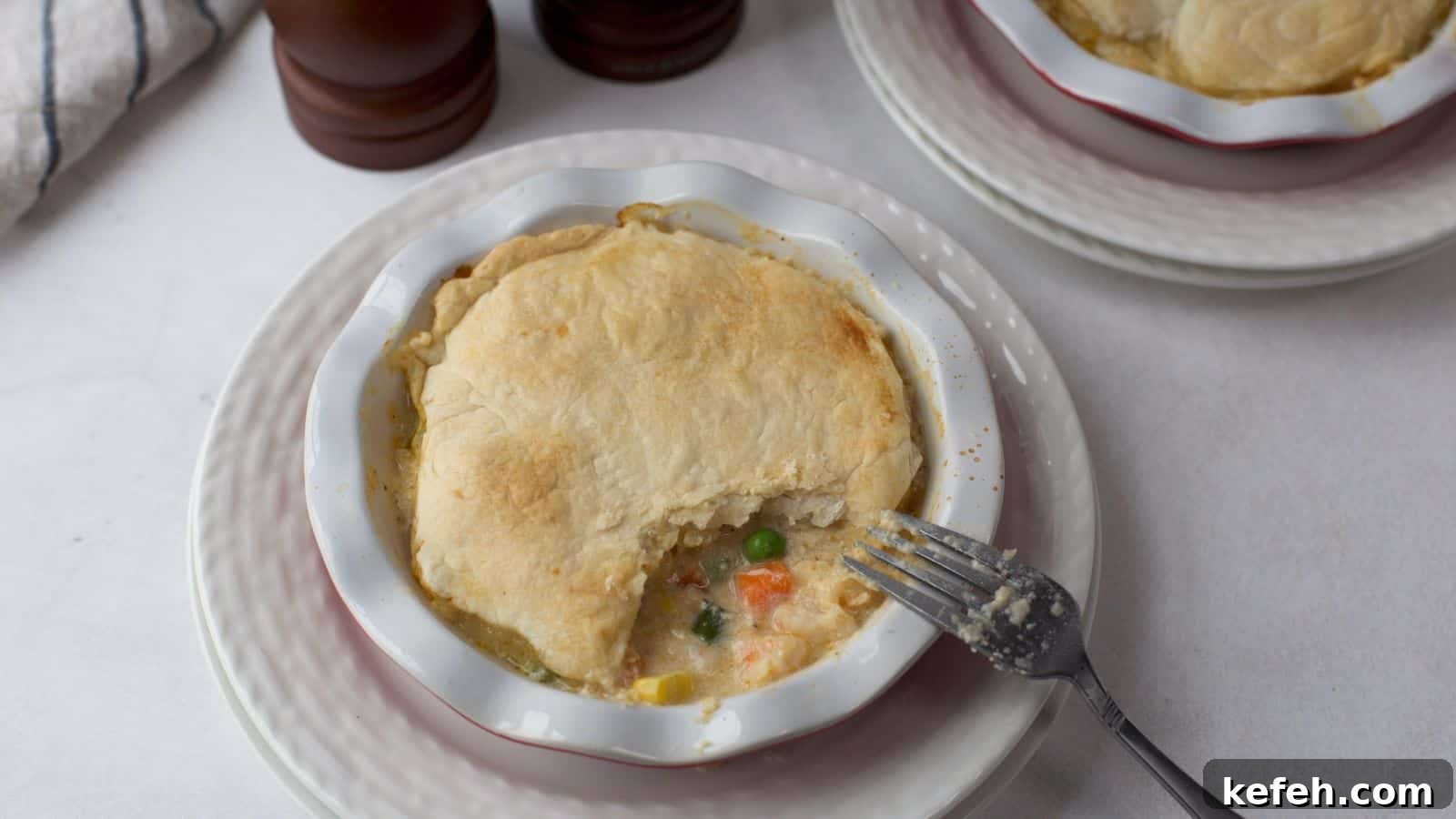 30 Seafood Recipes That Turn Weeknights Into a Vacation 30 Seafood Pot Pie in small pie dish.