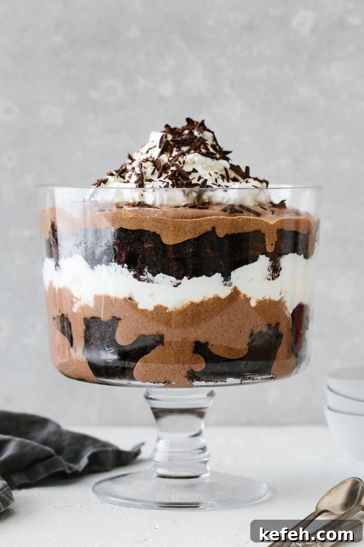 25+ Unique Thanksgiving Dessert Ideas to Impress Your Guests 6 A layered brownie trifle in a trifle bowl.