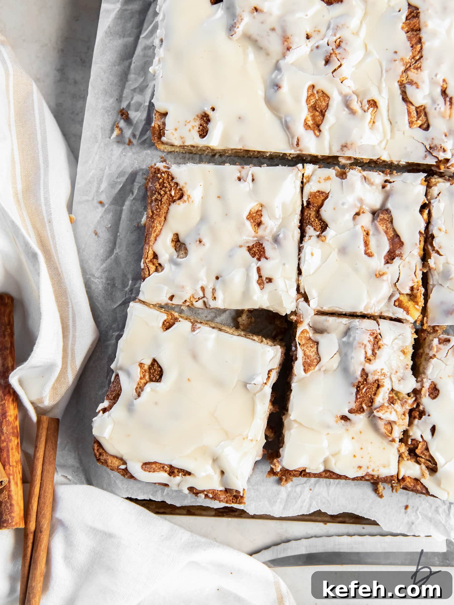tops of square honey bun cake slices with honey glaze.