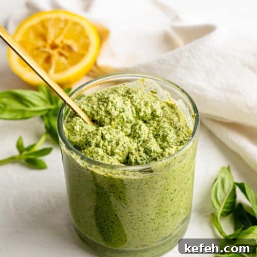 Sunflower Seed Basil Pesto Recipe — Nutritious Homemade Sauce 13 Sunflower Seed Pesto in a glass.