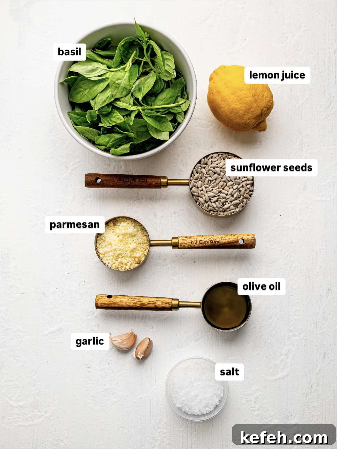 Sunflower Seed Basil Pesto Recipe — Nutritious Homemade Sauce 4 Sunflower Seed Pesto Recipe Ingredients on a counter.
