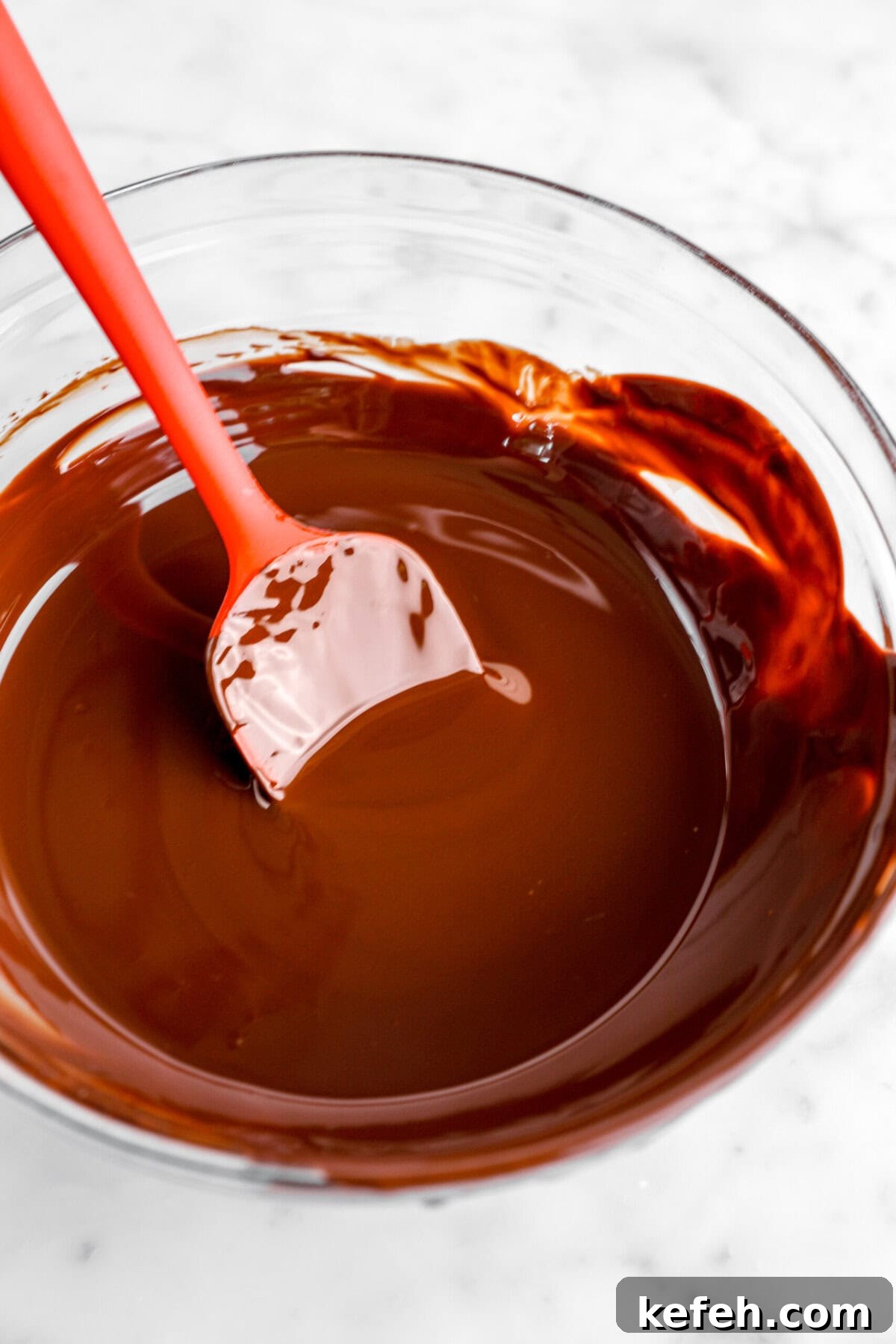 melted chocolate in glass bowl.