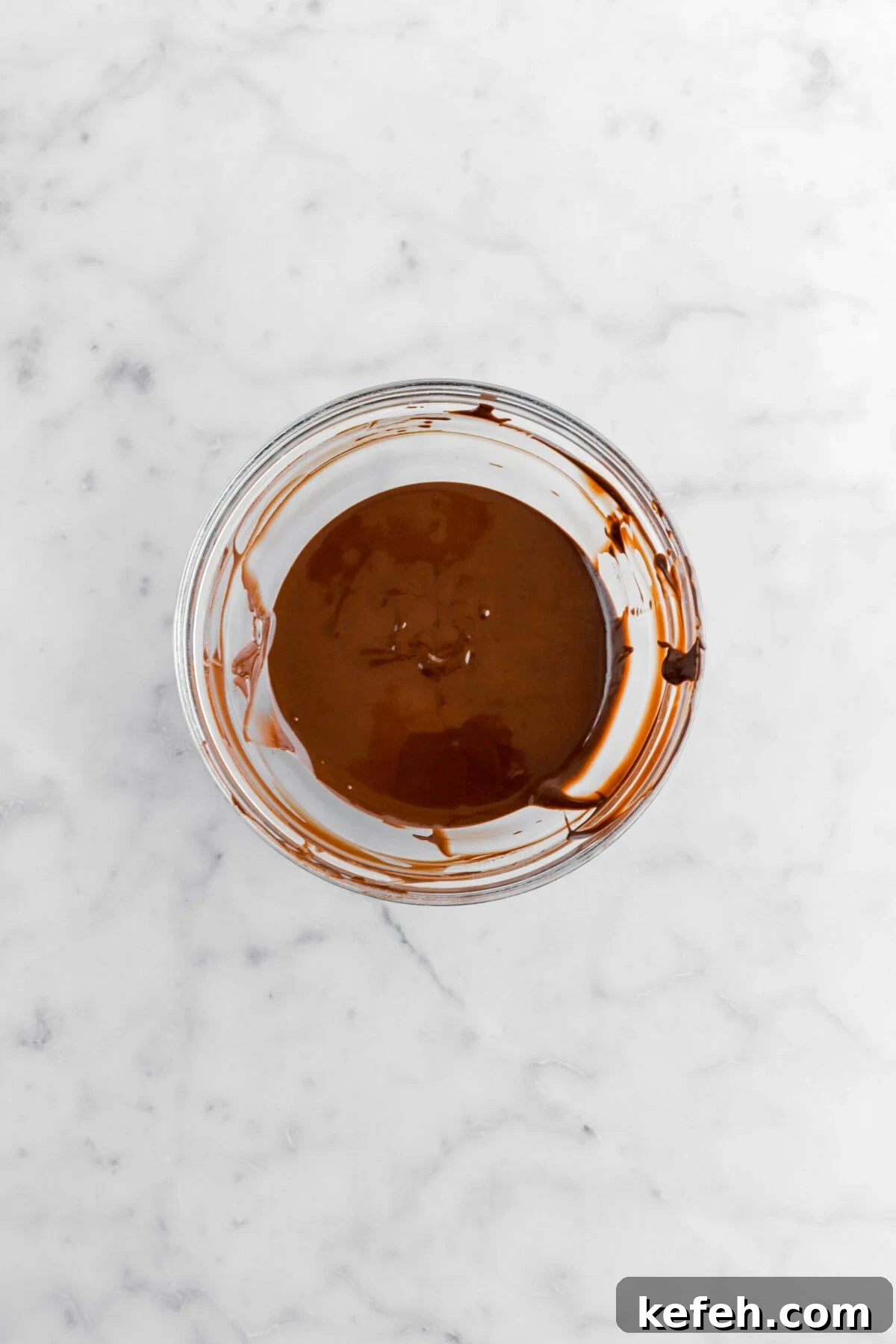 melted chocolate in glass bowl.