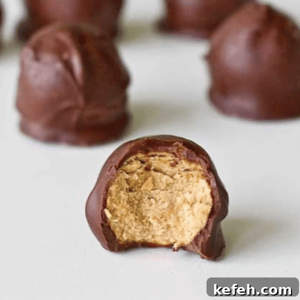 Chewy Cowboy Cookies with Oats, Chocolate & Pecans 21 A chocolate-covered round candy with a bite taken out