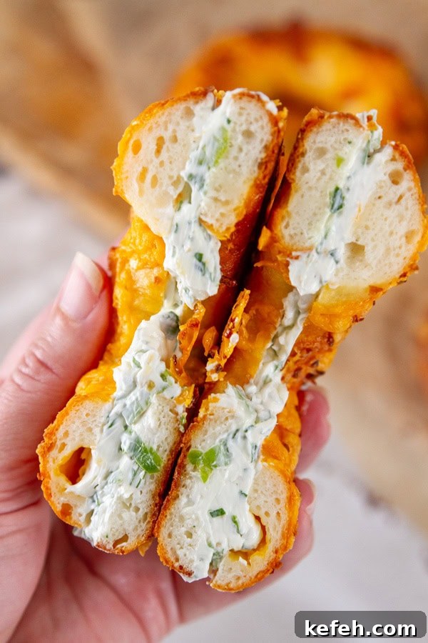 Loaded Stuffed Bagel Recipes: Creative Fillings and Toppings 9 loaded bagel stuffed with herb cream cheese.