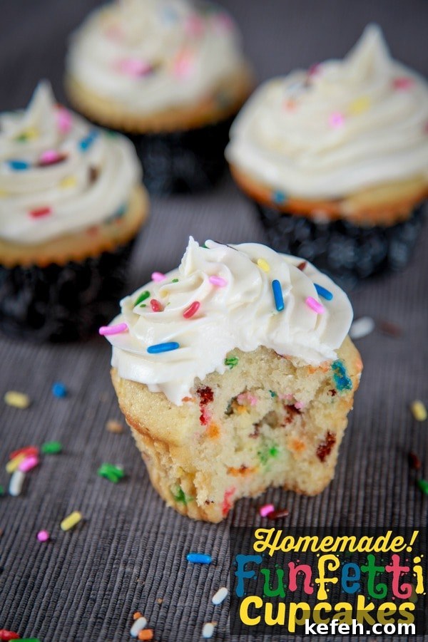 Funfetti cupcakes studded with sprinkles and topped with vanilla buttercream and more sprinkles 
