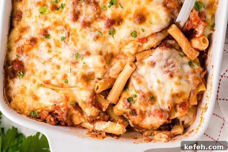 30 Ground Beef Dinner Recipes for Quick Family Meals 7 Baked Ziti served out of a white baking dish.