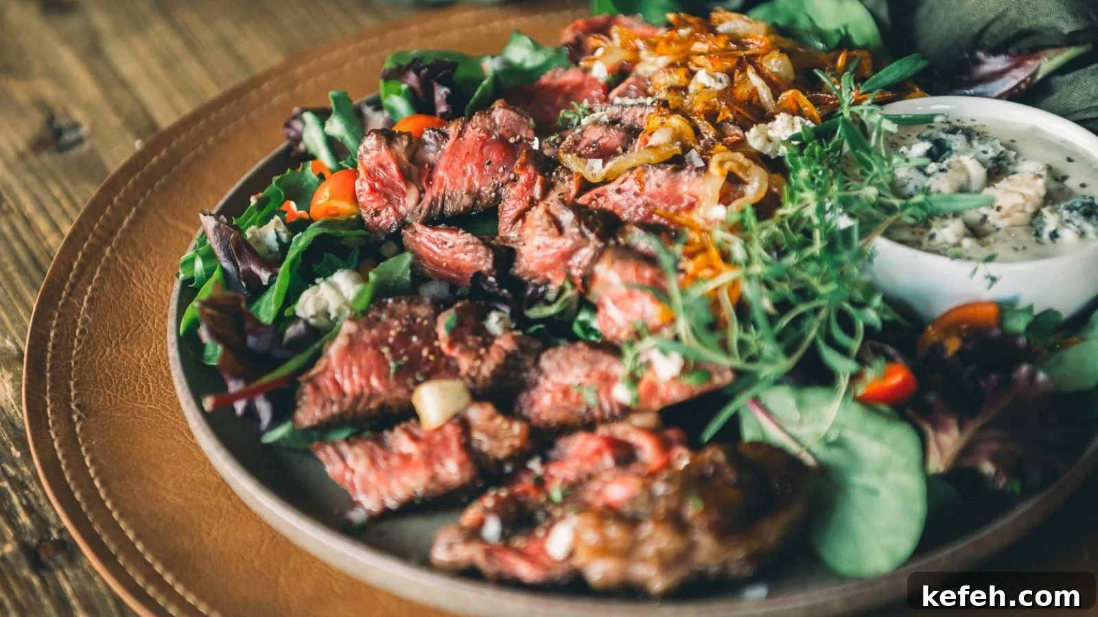 17 Budget-Friendly Steak Recipes to Feed a Crowd Without Breaking the Bank 18 Pan-seared chuck eye steaks sliced to show juicy pink centers with browned crust.