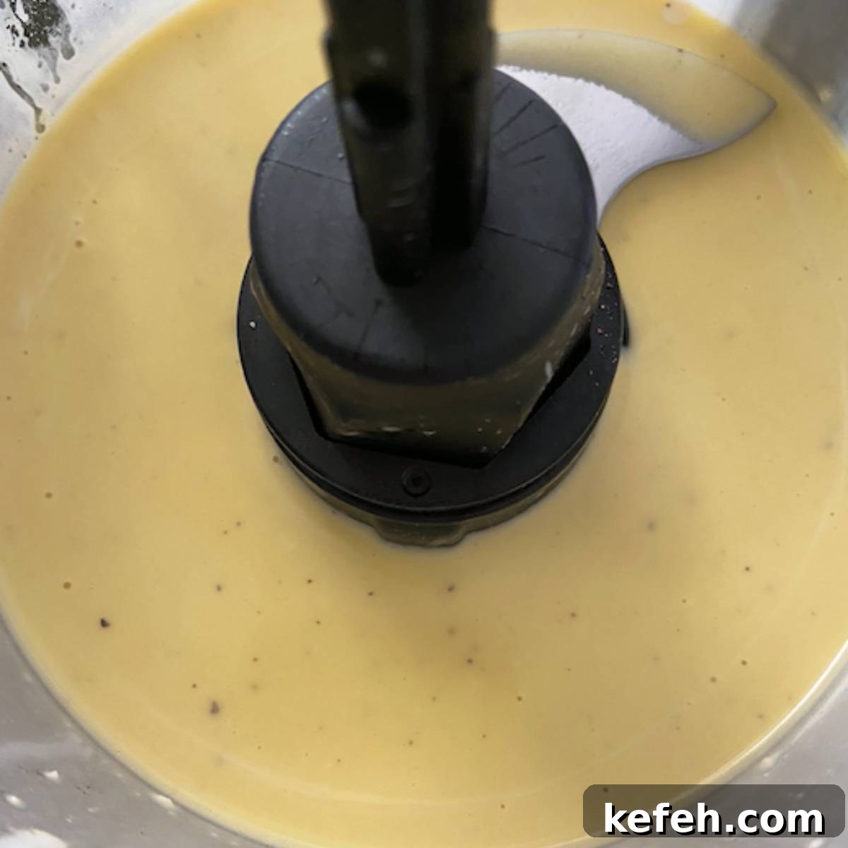 Creamy Caesar Salad Dressing Without Anchovies or Raw Eggs 6 Dressing in food processor after adding oil.