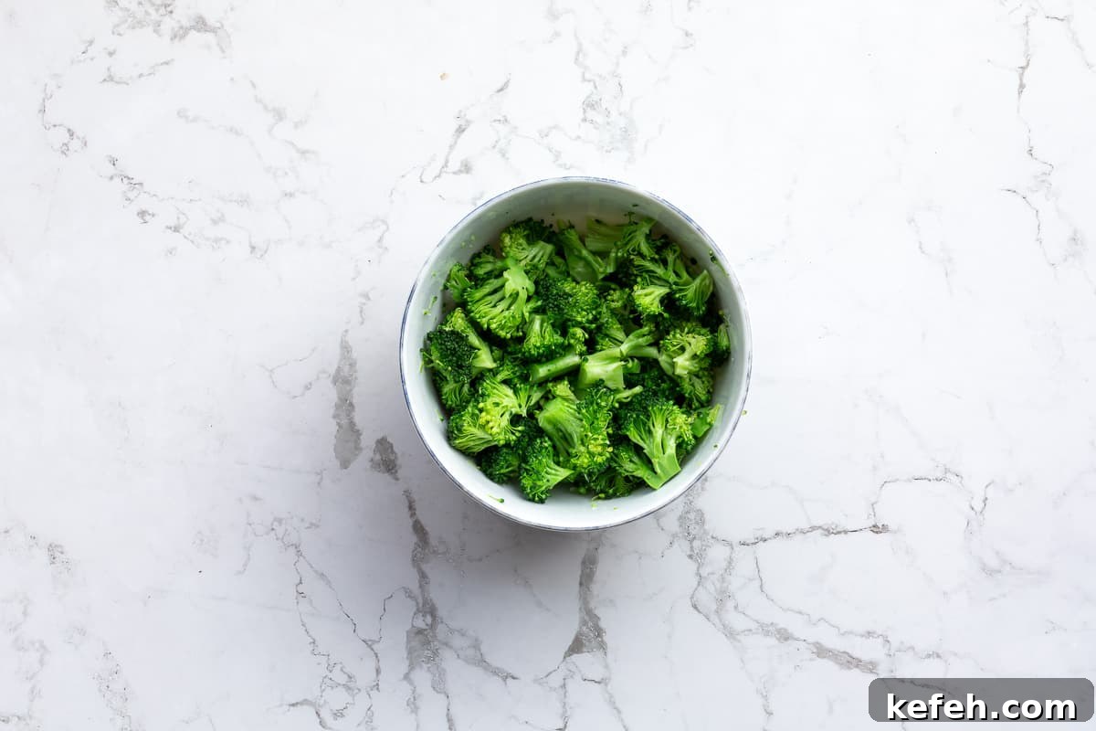 steamed broccoli in small bowl.