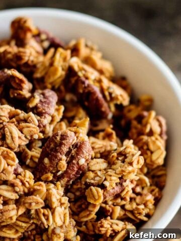 a with bowl of baked pumpkin spice granola