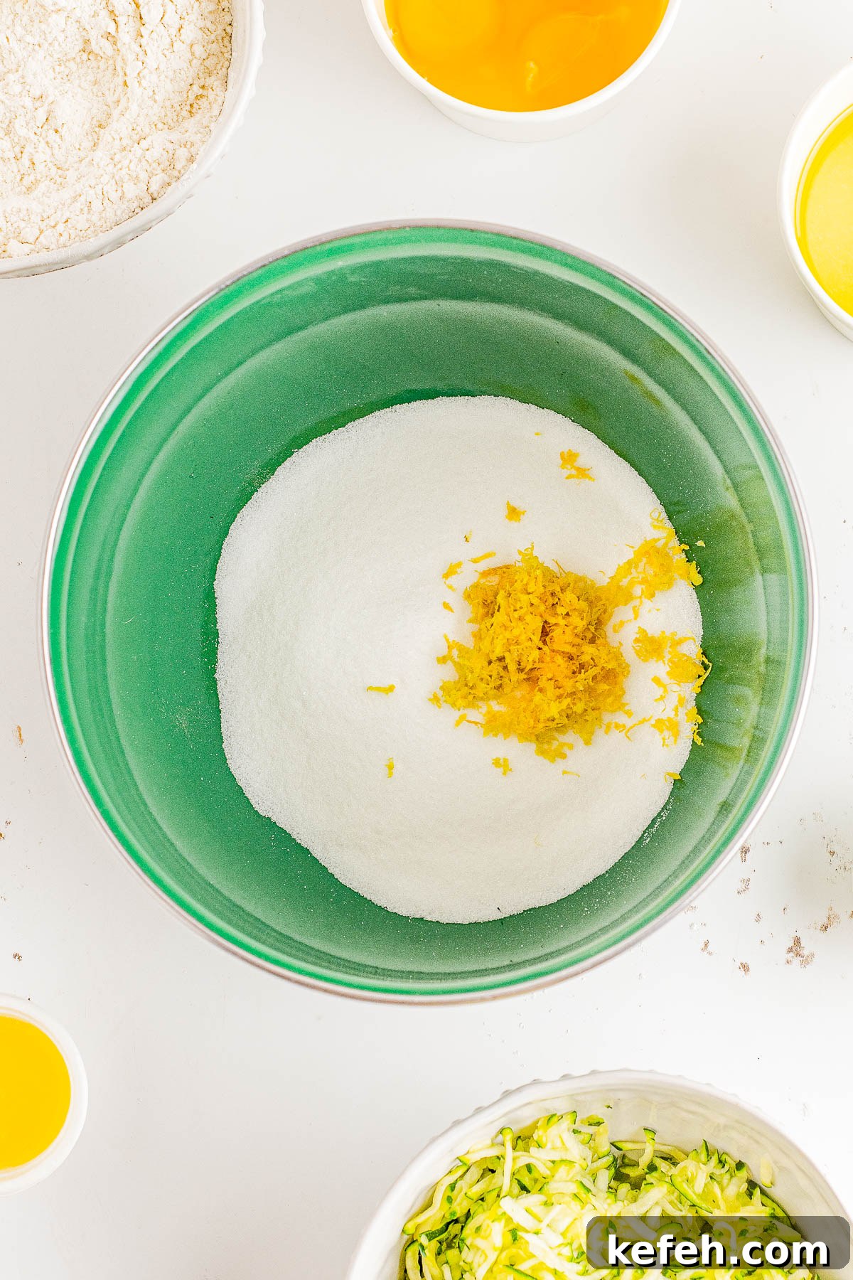 Sugar and lemon zest in a bowl. 