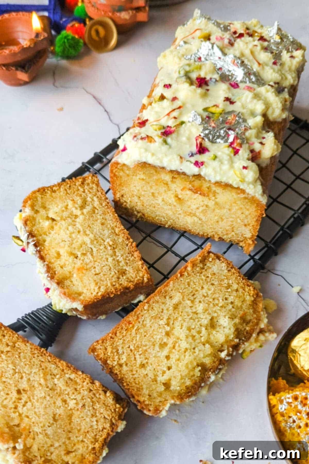 Eggless Gulab Jamun Mix Cake with Creamy Rabdi Recipe 2 slices of gulab jamun mix cake placed on a wire rack