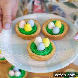 Easter Nest Cookie Cups Recipe 6 Easter birds nest cookie cups, on a plate.