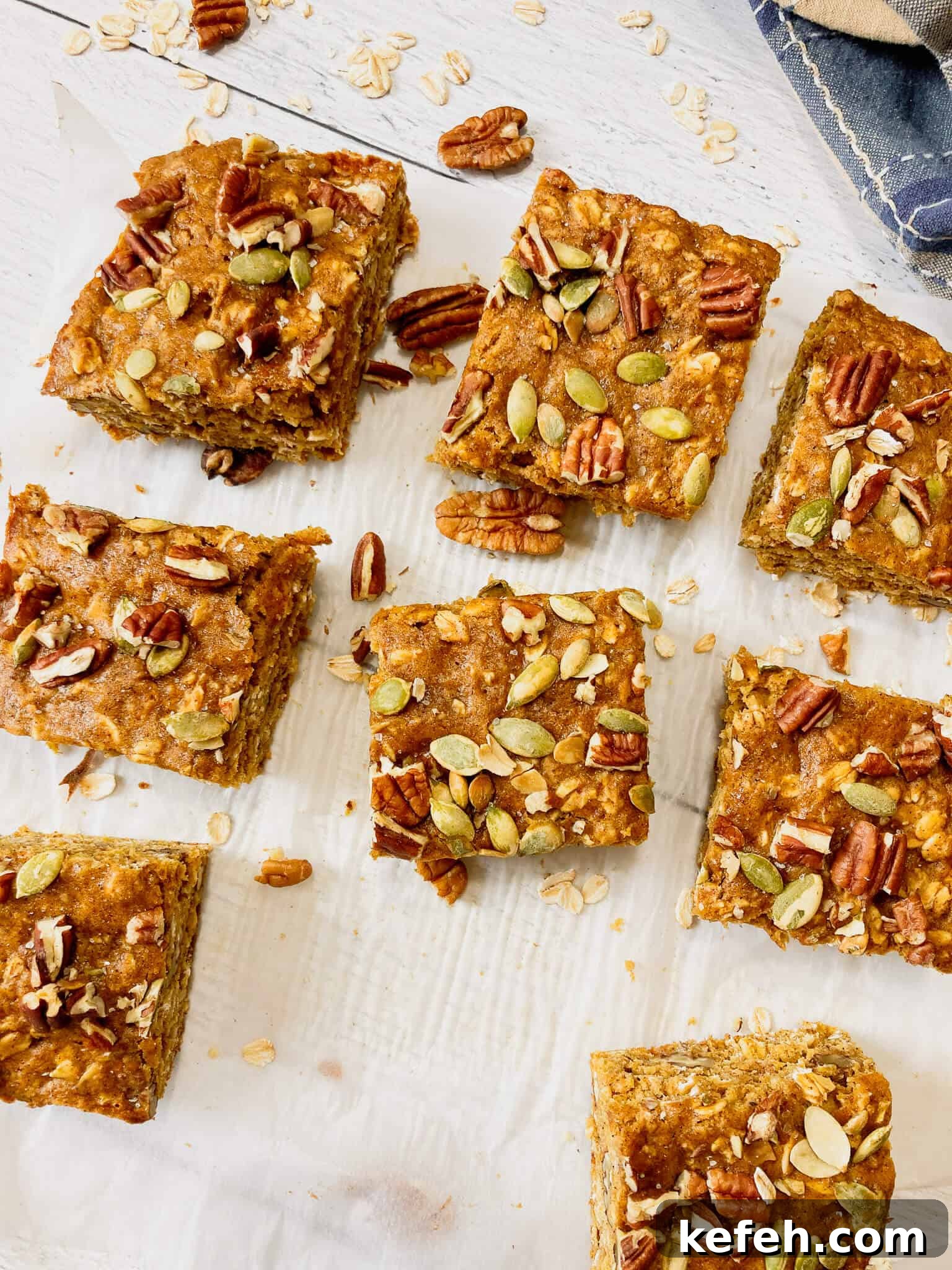 Pumpkin Oatmeal Breakfast Bars 5 Pumpkin oatmeal bars cut into sqares.