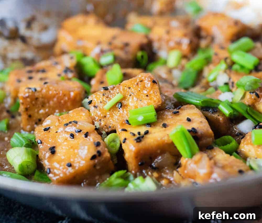 Ginger and Garlic Tofu Stir-Fry Recipe 5 garlic ginger tofu readiny to eat and shining with garlic ginger sauce