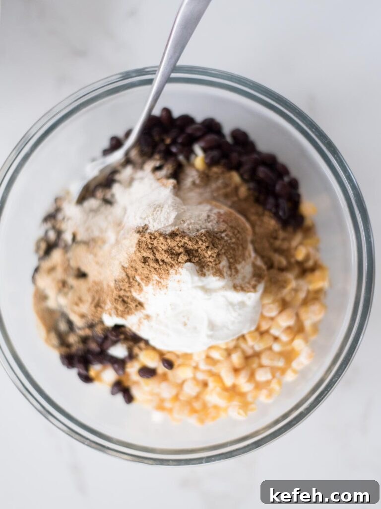 Tex Mex Chicken with Black Beans and Rice Casserole 8 Seasonings added over the sour cream.