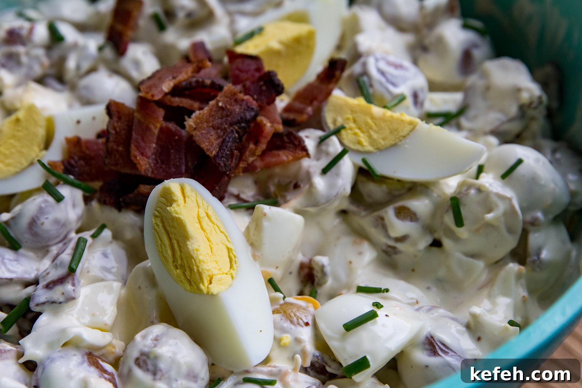Smoked Potato Salad with Crispy Bacon and Dijon Dressing 11 Serving of smoked potato salad with chives