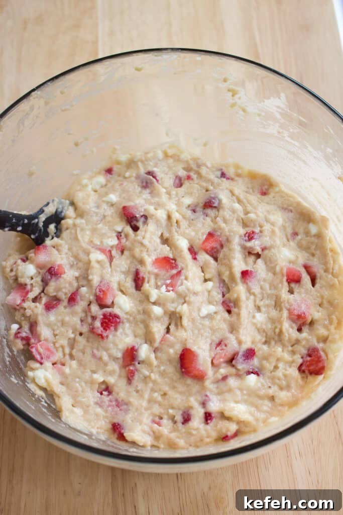 Light and Fluffy Strawberry Cottage Cheese Muffins 9 Muffin batter with strawberries
