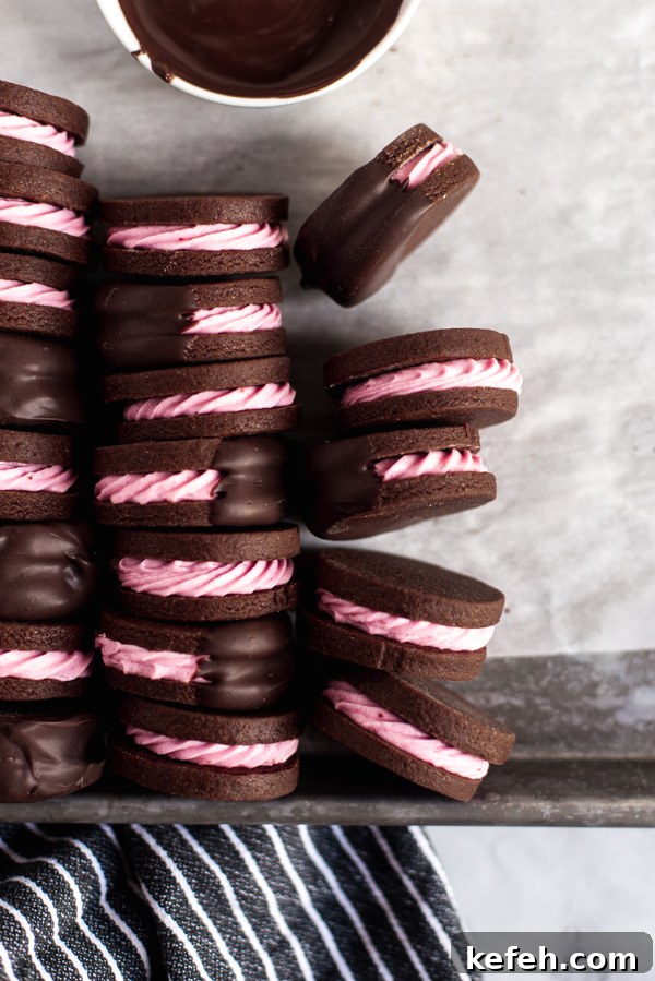 Strawberry Chocolate Sandwich Cookies with Creamy Filling 4 Baked chocolate cookies