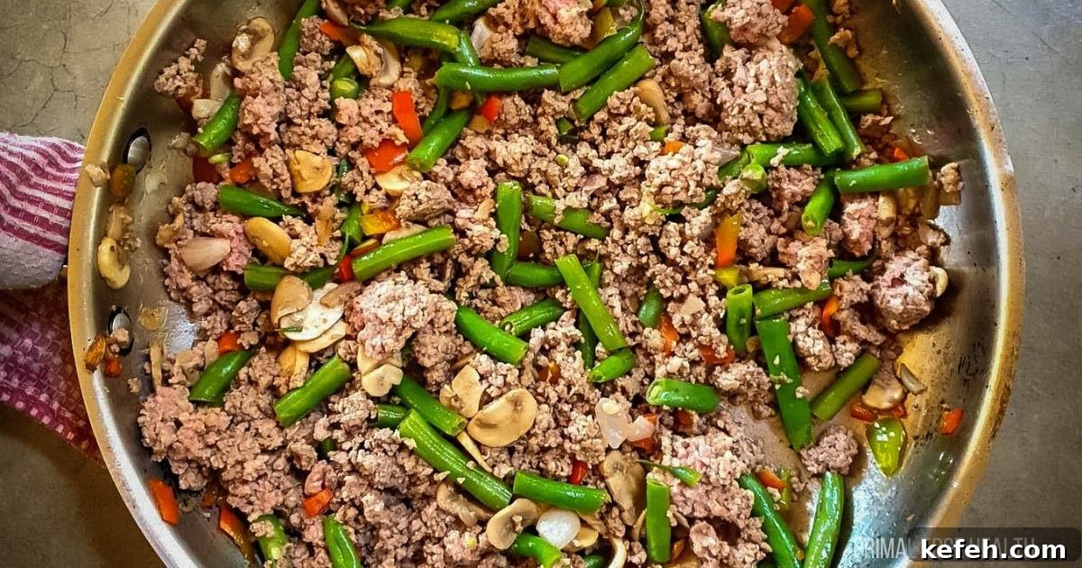 25 Low-Carb Dinners Even Carb Lovers Can't Resist 26 A picture of ground beef and green bean stir-fry in stainless steel skillet.