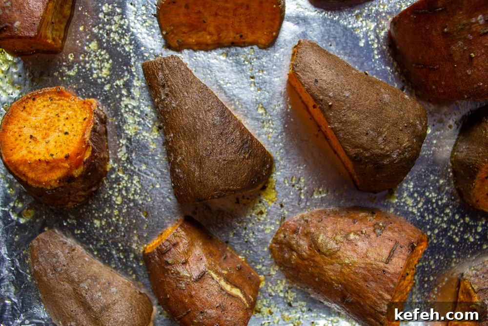 Crispy Roasted Sweet Potatoes with Garlic and Herbs 5 sweet potatoes on tray