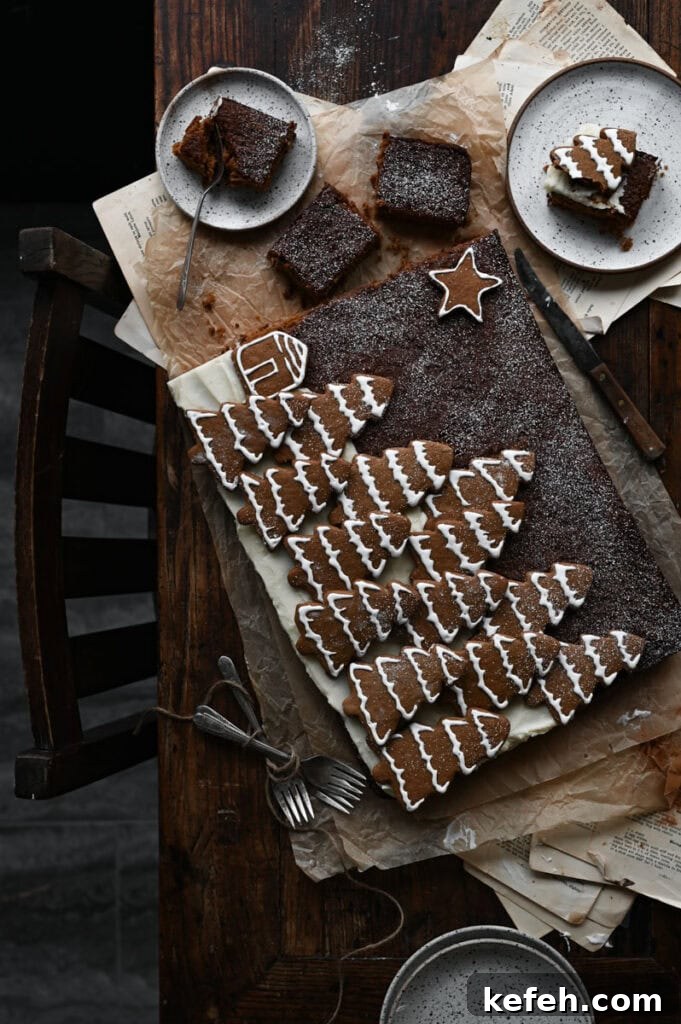 Classic Moist Gingerbread Cake Recipe 12 Chocolate cake covered in tree shaped gingerbread cookies.